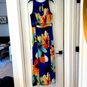 Beautiful royal blue with yellow, light blue and light orange flowers.